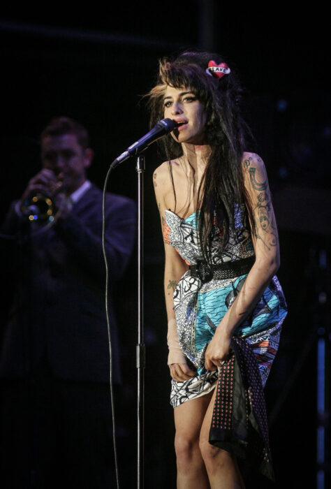 																																										<h5>Amy Winehouse</h5>
																											